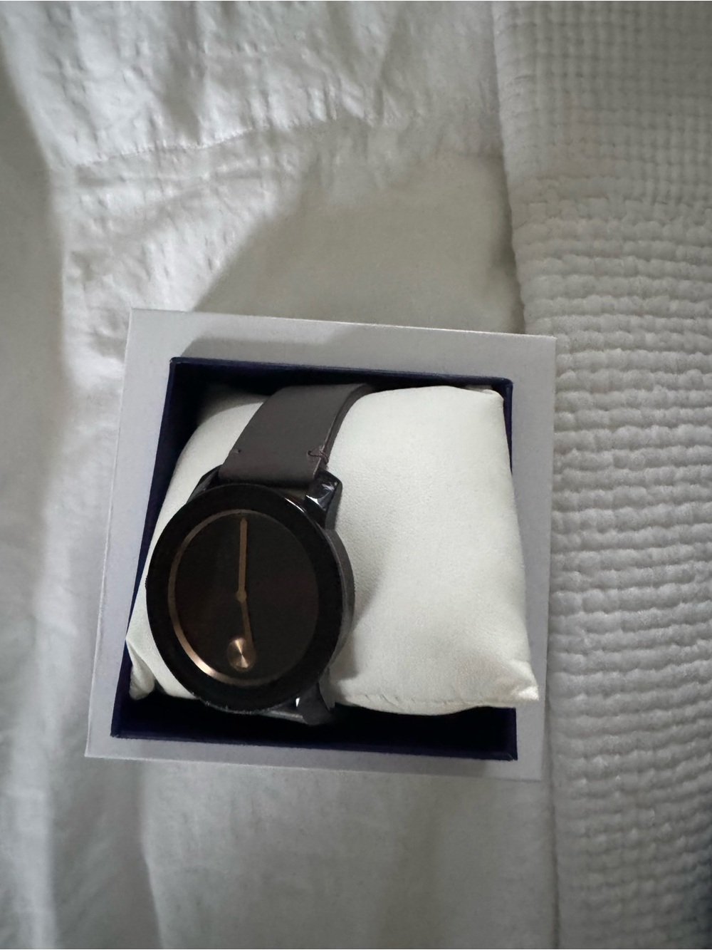 Movado Black Watch with Gold-Tone Hands